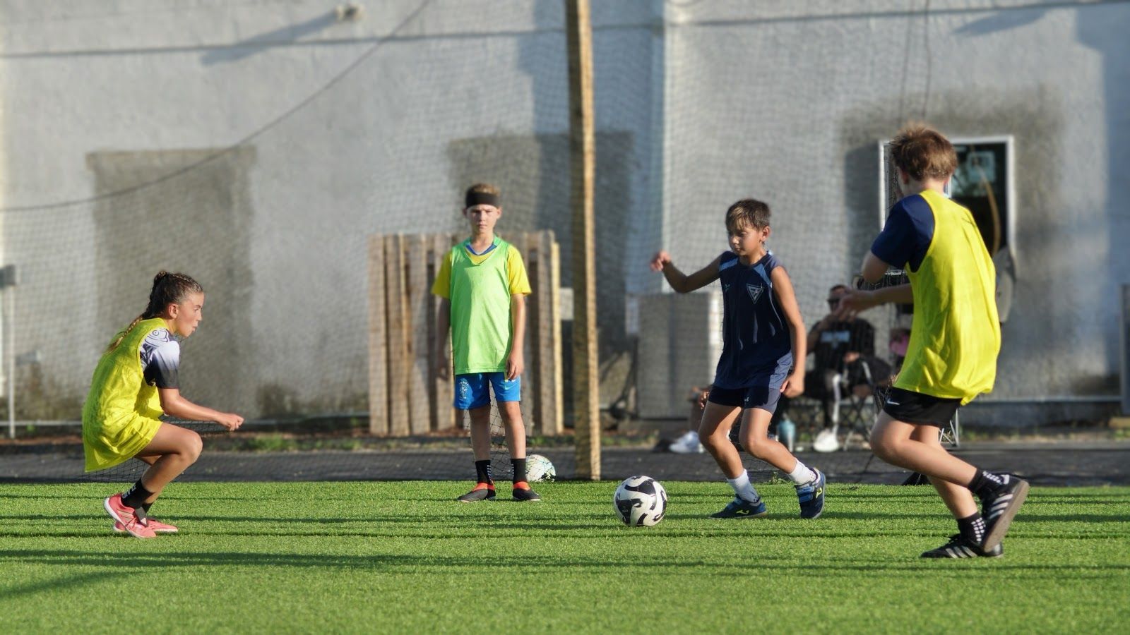 Futboland Academy players training on the field